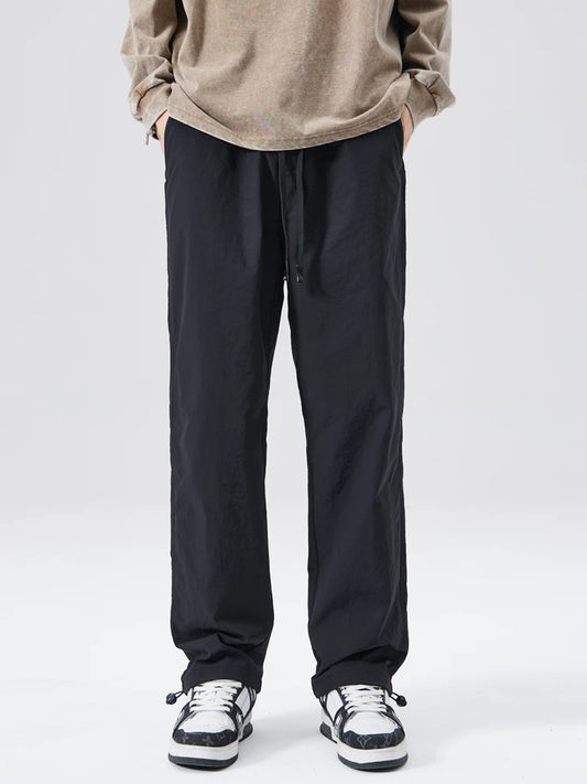 Pantalones rectos repelentes al agua para hombre - Forro de malla y corte holgado estilo casual