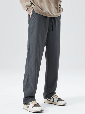 Pantalones rectos repelentes al agua para hombre - Forro de malla y corte holgado estilo casual